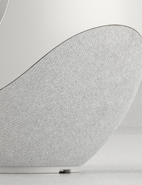 Pantheone I white speaker detail showing acoustic mesh and sculpted design edge
