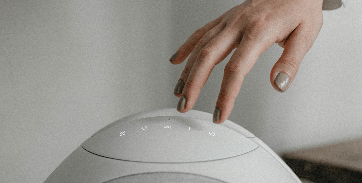 Top view of Pantheone I white speaker showing touch-sensitive interface