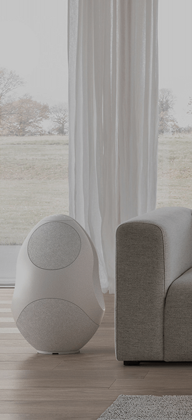 pantheone I white sculptural wireless speaker in luxurious living room