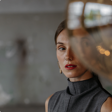 a women looking at designer light 