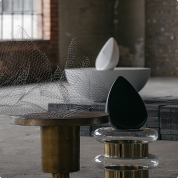 A pair of Obsidian luxury speakers on modern objects