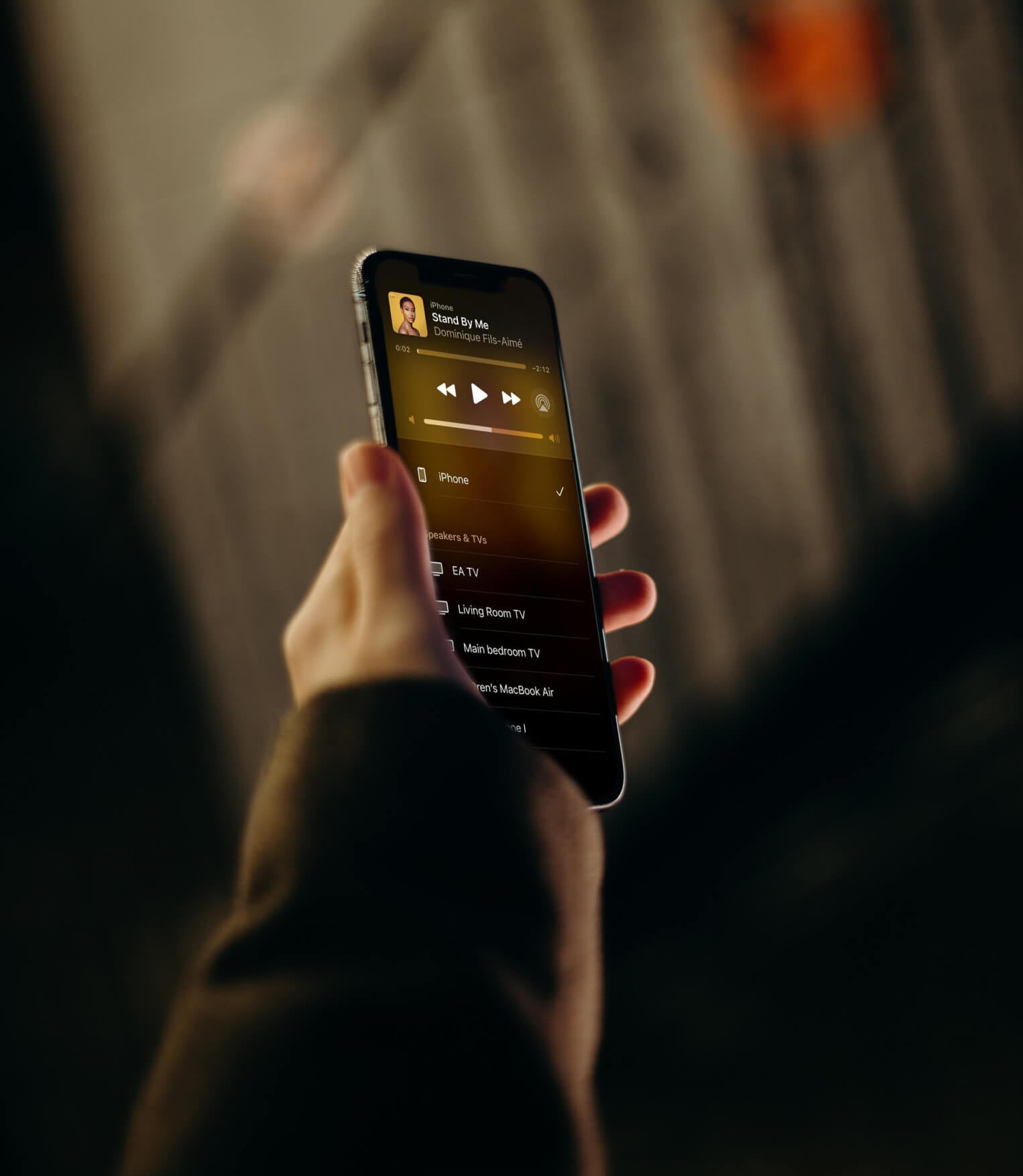 A Hand holding a mobile phone looking at the Pantheon App