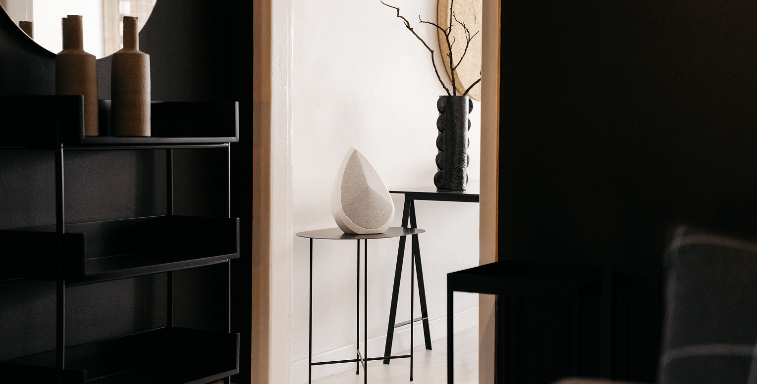 Obsidian white wireless speaker with minimalist sculptural design