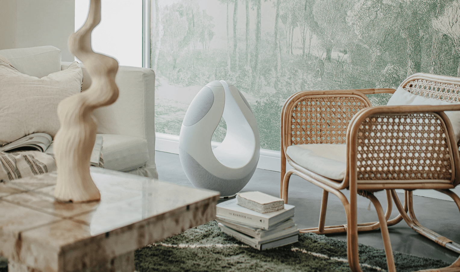 pantheone I white luxury speaker sculpture placed beside a sofa