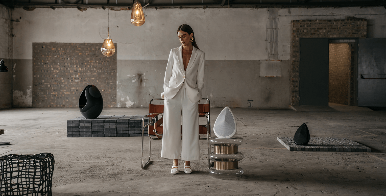 pantheone I and obsidian luxury speakers in an industrial-style apartment