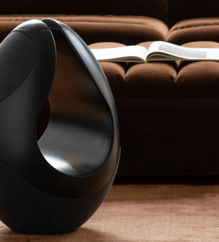 Black Pantheone I high-end wireless speaker in modern luxury interior 